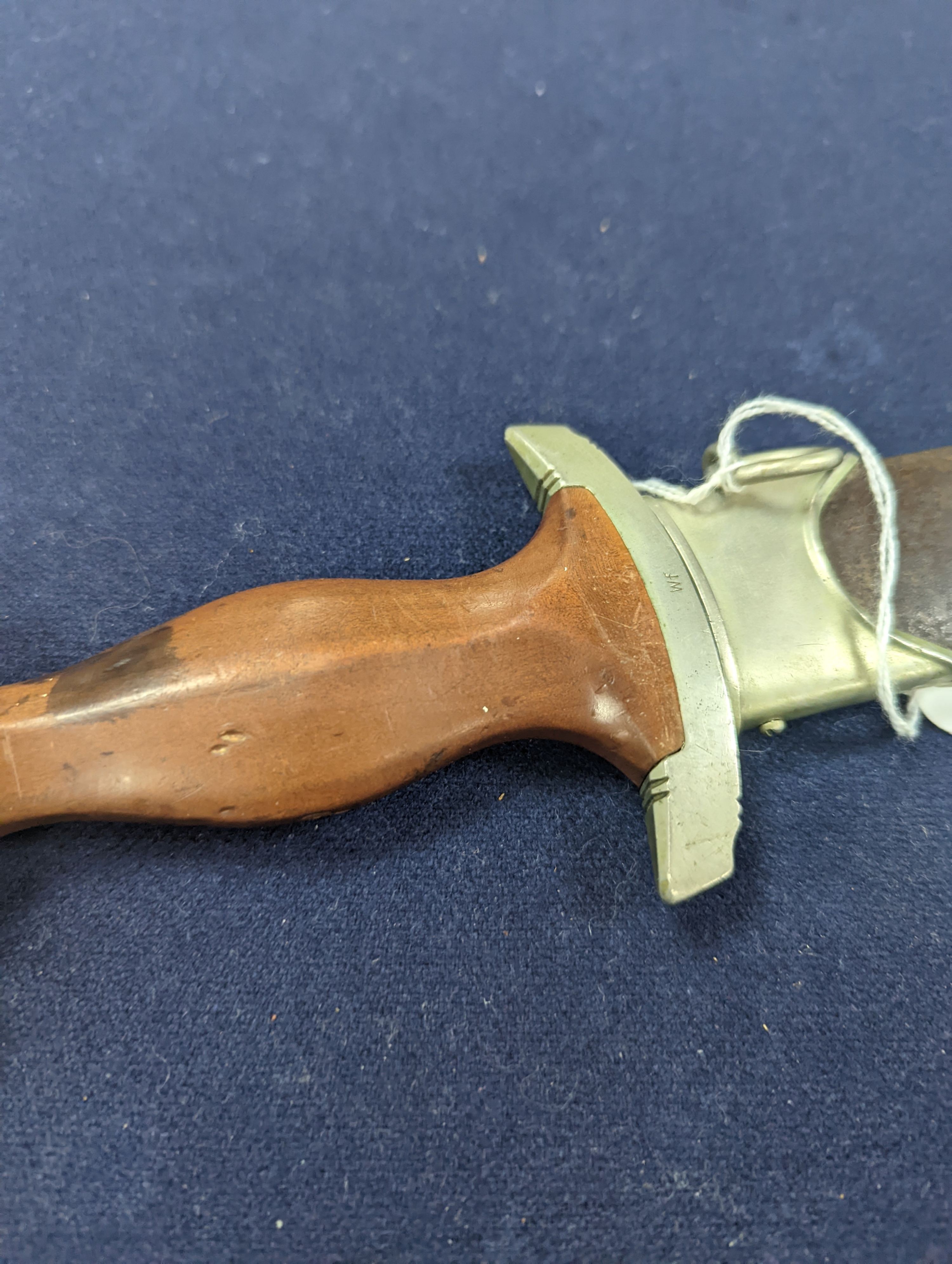 A Third Reich SA dagger within sheath, blade 22cm., and a bayonet within scabbard